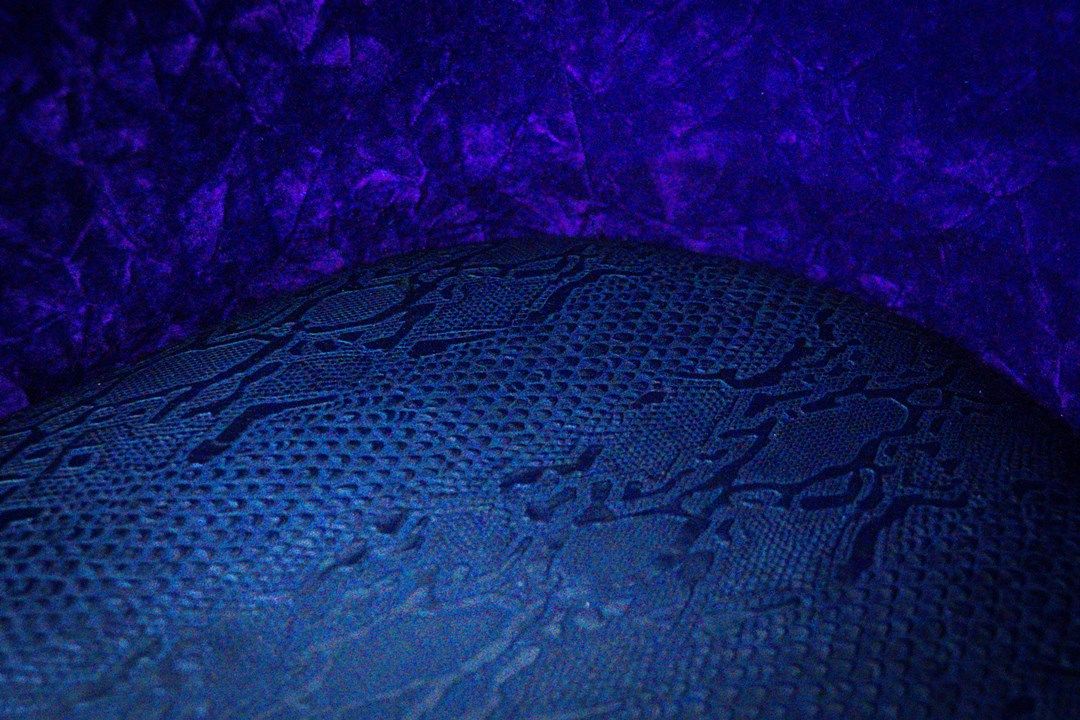 bar stool with blue crocodile seat detail