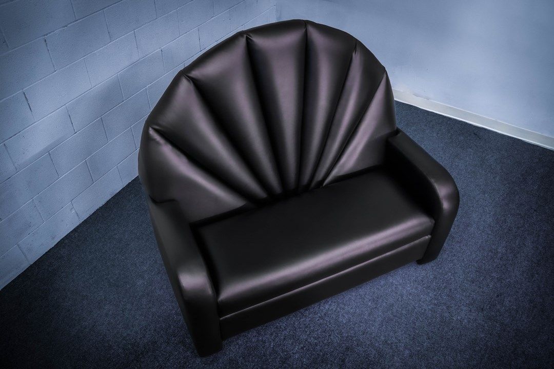 love seat vertical channel back in black vinyl top view